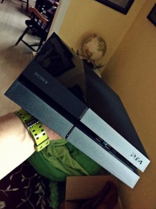 Man with his PS4, photo by Blake Patterson