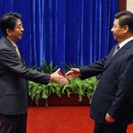 Prime Minister Shinzo Abe and Chinese President Xi Jinping Exchange Niceties