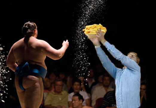Tourist grateful for extra salt at sumo tournament (original photo by Rich Iwasaki)